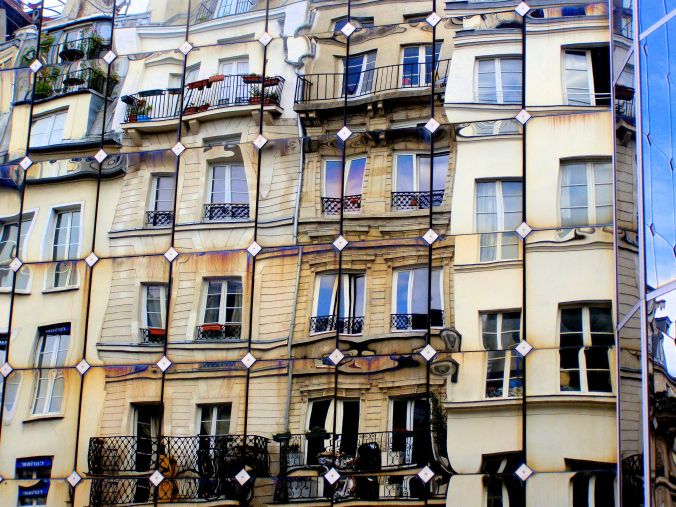 An Enigmatic Reflection. This faceless building, clad in reflective panels, reflects its older, residential, counterpart in Rue Rambuteau, 75004 Paris. The contemporary reflects the traditional. https://witness.theguardian.com/assignment/552e3c5be4b0dfcbad6c3d9f/1477750