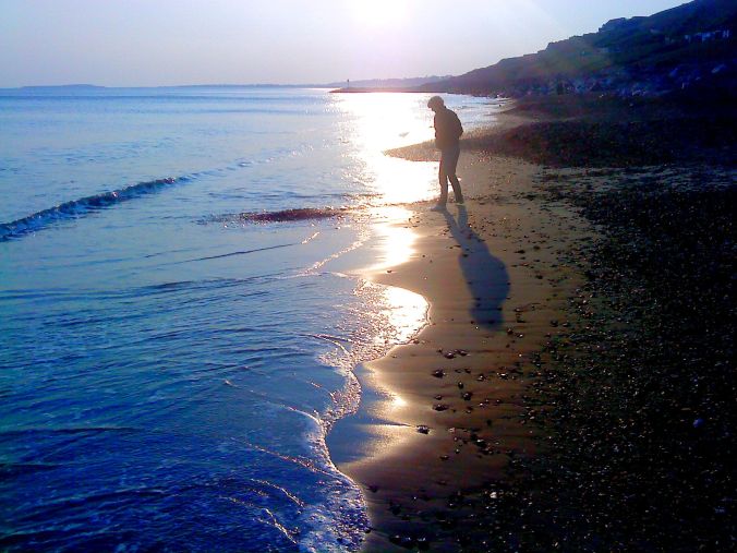 Good Day Sunshine. That time just before dusk, when the sun is low in the sky and is coming in for the night; that split second when the receding waves brought the sun to my feet as it cast its long shadows. https://witness.theguardian.com/assignment/555df2ebe4b05f67319aeab4/1535711