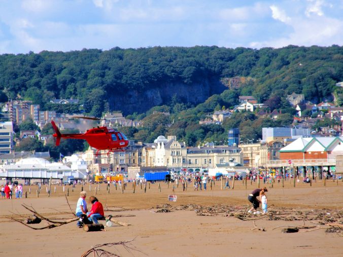An Attention Seeker Hovering Around The Beach. A colourful moment at Weston-Super-Mare. https://witness.theguardian.com/assignment/55afb147e4b0571ff3516306/1652721